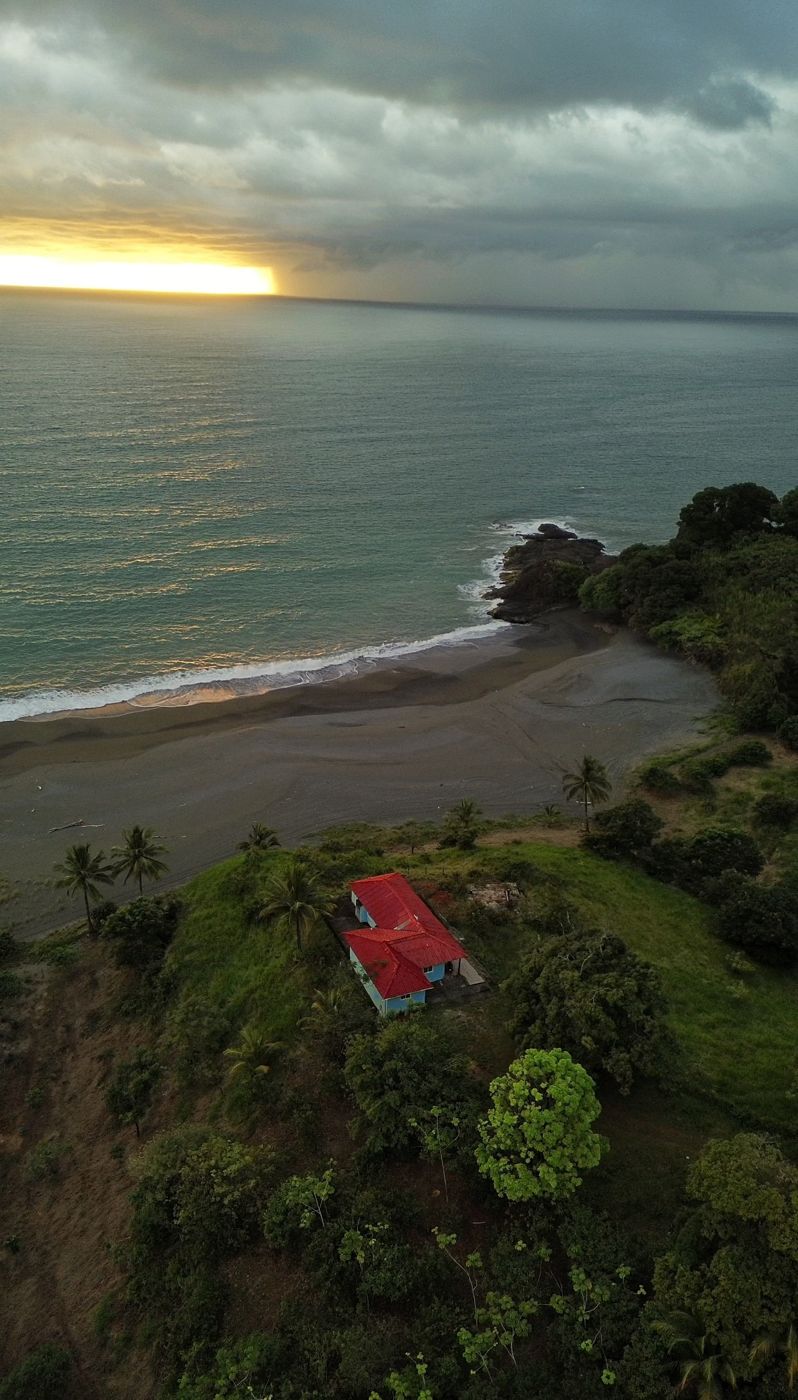 Aerial view of Roca Tortuga on the hill above the bay and Turtle Rock